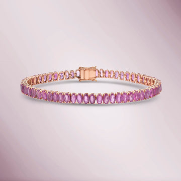 Oval Shape Pink Sapphire Tennis Bracelet (23.00 ct.) 4-Prongs Setting in 14K Gold
