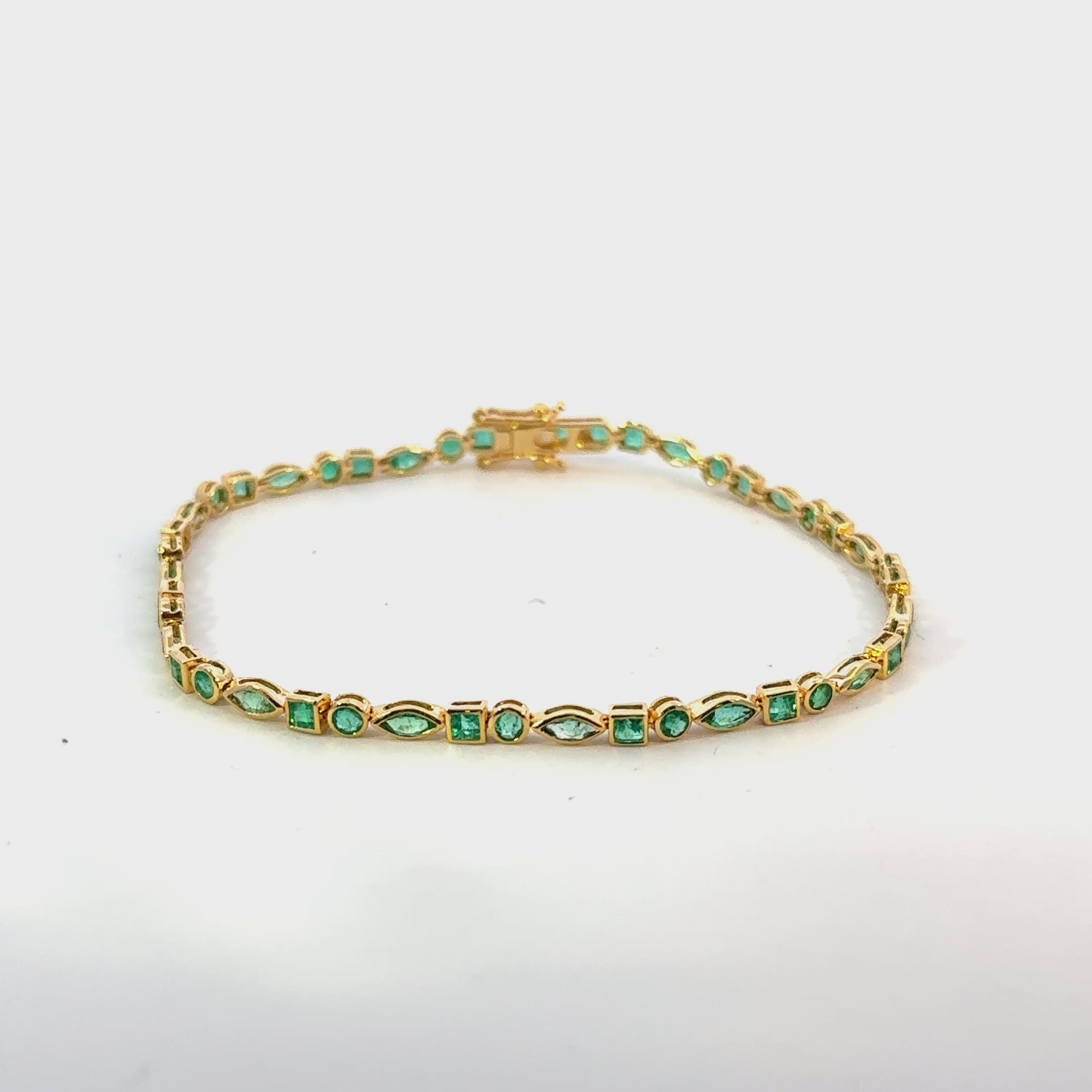 Multi Shape Emerald Bezel Setting Tennis Bracelet (2.50 ct.) in 14K Gold