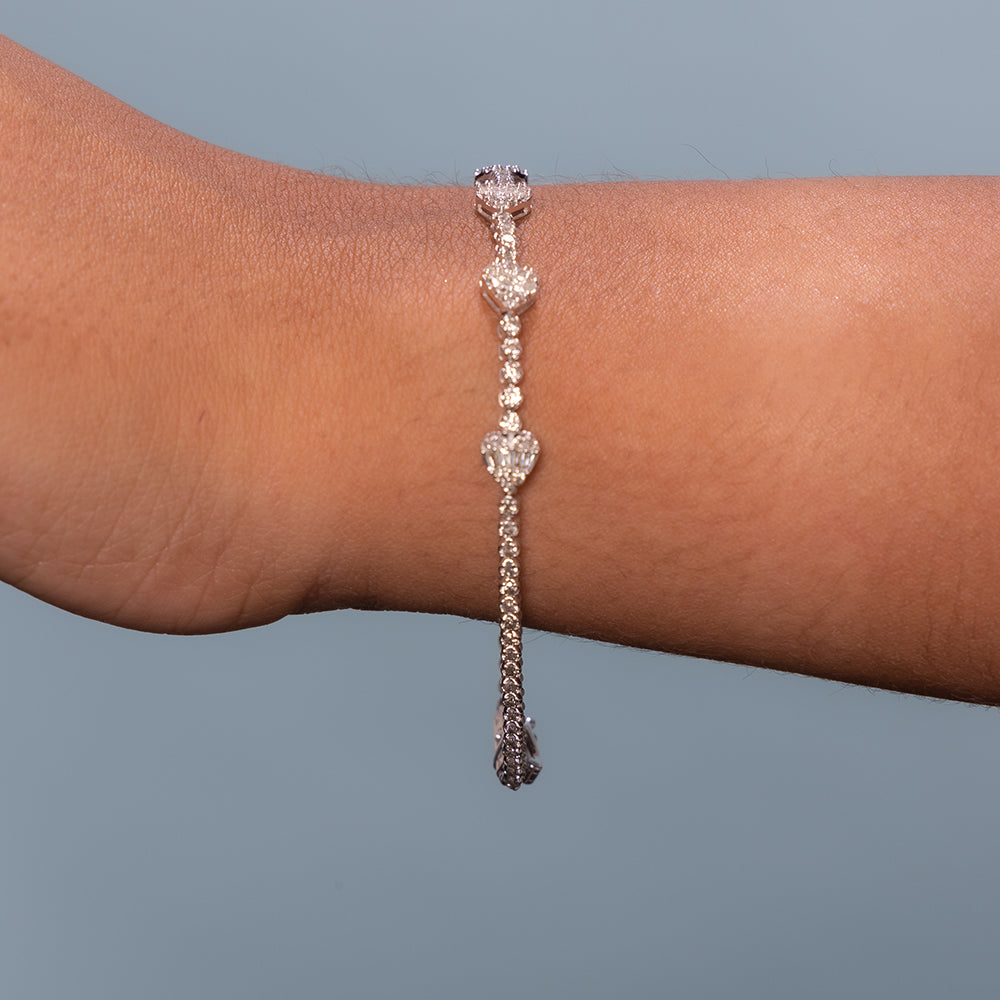 Round and Baguette Diamonds Heart Shape Tennis Bracelet (1.15 ct.) in 14K Gold