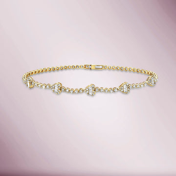Round & Baguette Diamonds Heart Shape Tennis Bracelet (1.70 ct.) Buttercup Setting in 14K Gold