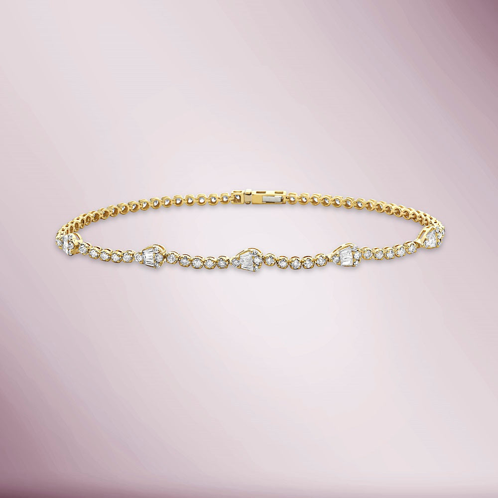 Round & Baguette Diamonds Pear Shape Tennis Bracelet (1.50 ct.) Buttercup Setting in 14K Gold
