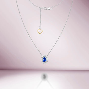 Oval Blue Sapphire With Diamond Double Halo Necklace (0.73 ct.) in 18K Gold