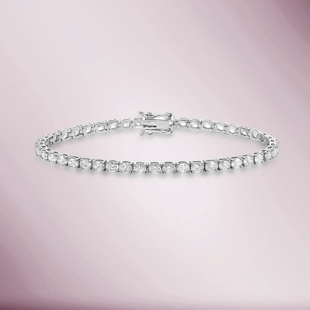 Oval Shape Diamond Tennis Bracelet (5.00 ct.) 4.75 mm 4-Prongs Setting in 14K Gold