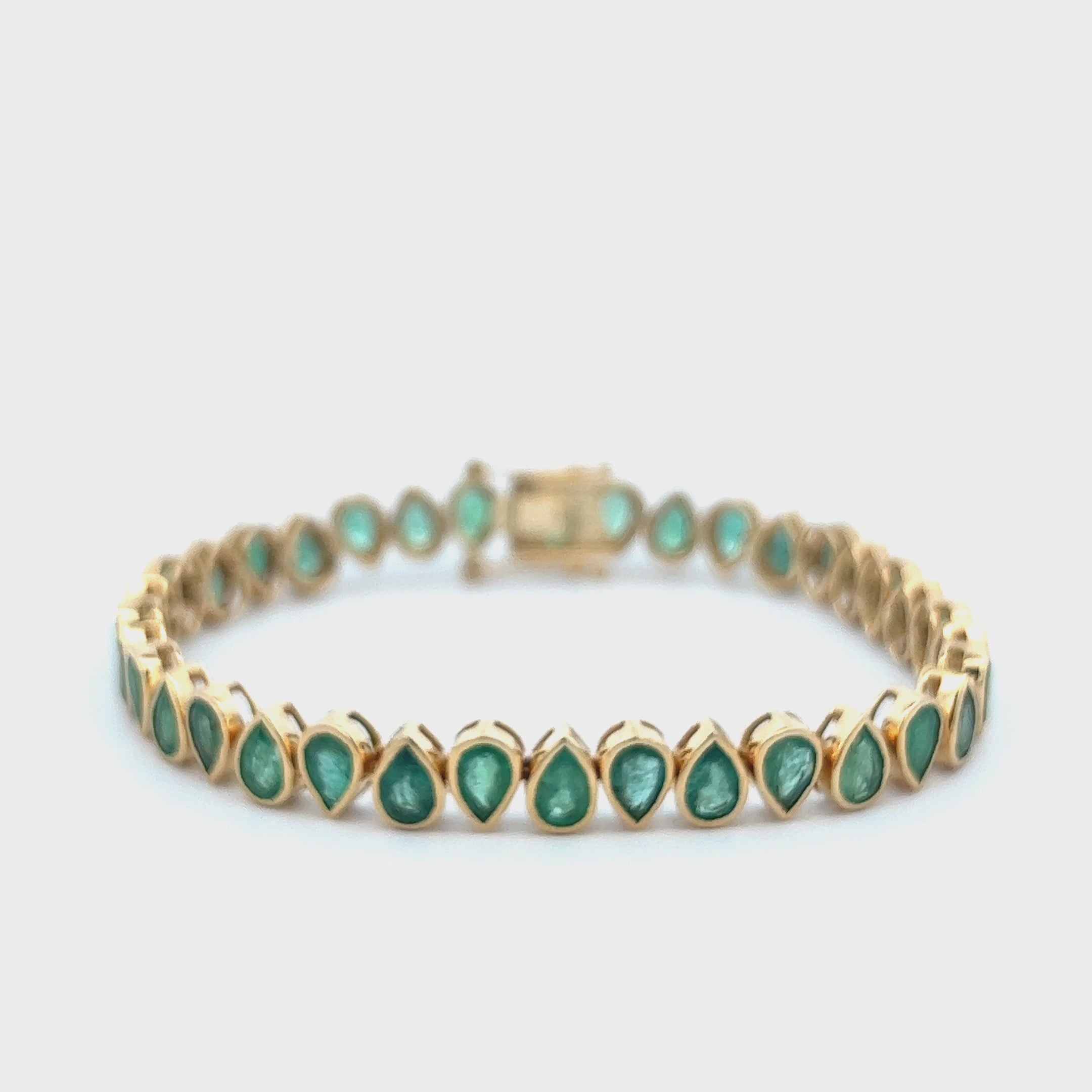 Fancy Pear Shape Emerald Bracelet (12.80 ct.) in 14K Gold